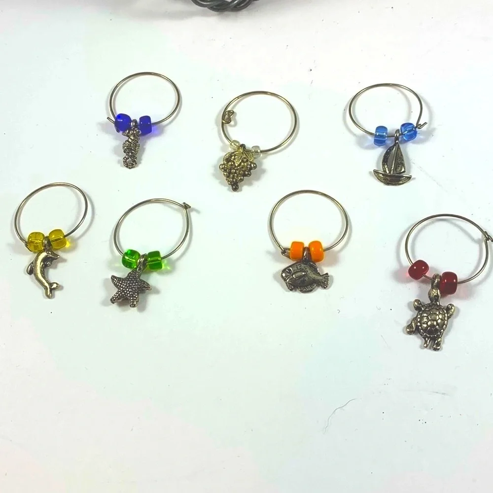 WINE CADDY, WINE CHARMS & WINE BOTTLE STOPPER
